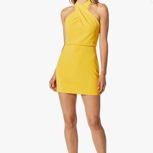 Yellow Halston mini dress, perfect for wedding guests or cocktail events